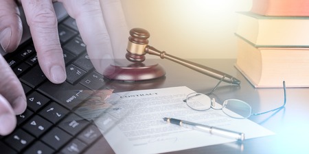 Judge gavel with contract (random english dummy text used); multiple exposureの写真素材