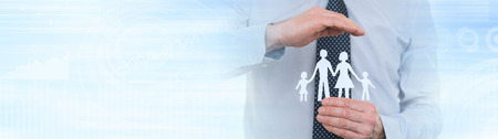 Insurer protecting a family, concept of insured family. panoramic bannerの写真素材