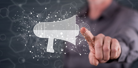 Man touching a network communication concept on a touch screen with his fingerの写真素材