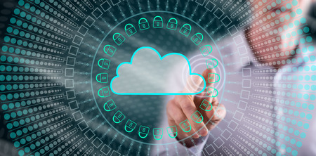 Man touching a cloud networking concept on a touch screen with his finger