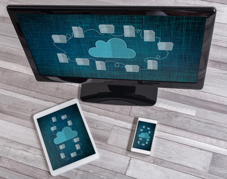 Cloud storage concept shown on different information technology devices