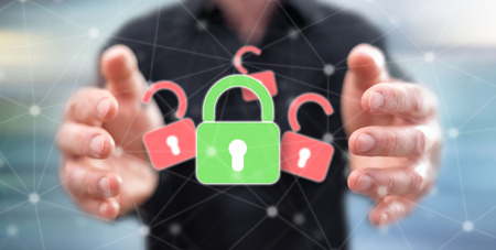 Data security concept between hands of a man in backgroundの写真素材