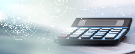 Calculator on financial documents, accounting concept, closeup. multiple exposureの写真素材