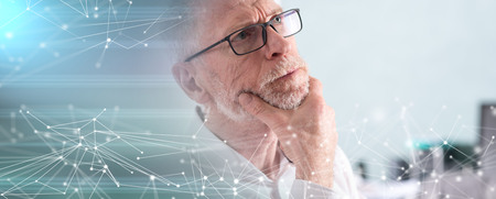 Portrait of thoughtful senior businessman; multiple exposure