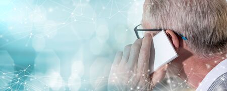 Senior businessman talking on mobile phone. multiple exposure