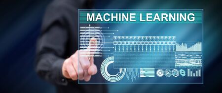 Man touching a machine learning concept on a touch screen with his fingerの写真素材