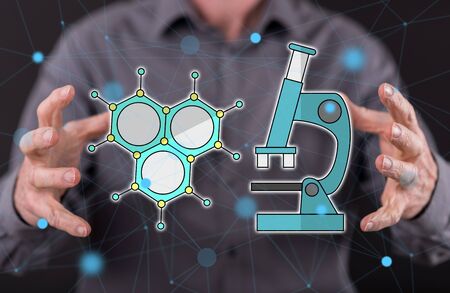 Medical research concept between hands of a man in backgroundの写真素材