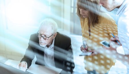Business people working together in office, light effectの写真素材
