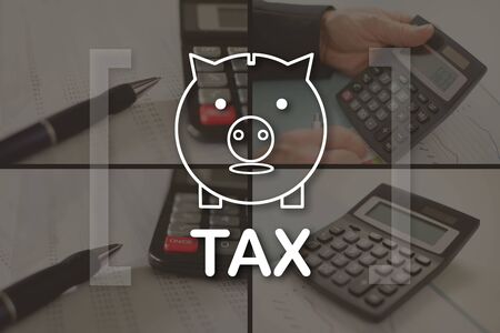 Tax concept illustrated by pictures on backgroundの写真素材