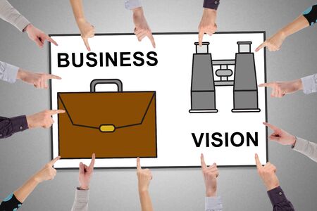 Hands pointing to business vision conceptの写真素材