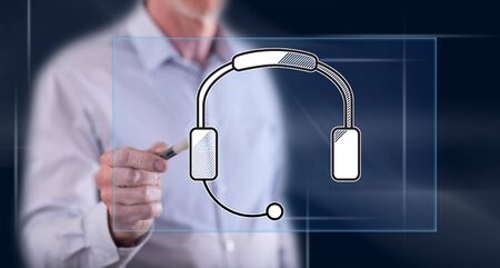 Man touching a technical support concept on a touch screen with a penの写真素材