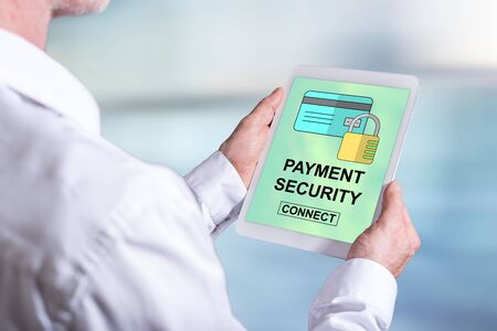 Tablet screen displaying a payment security conceptの写真素材