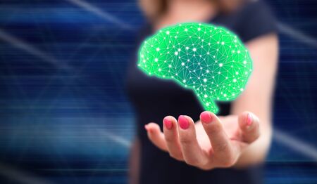 Intelligence concept above the hand of a woman in background