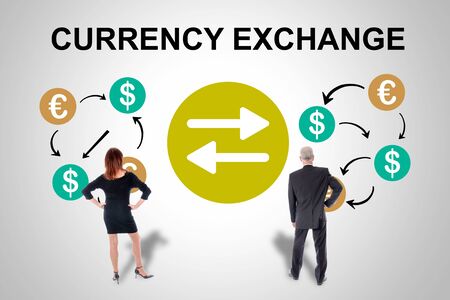 Currency exchange concept drawn on a wall watched by business peopleの写真素材
