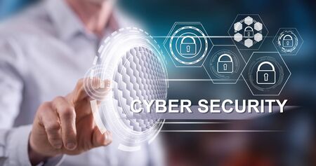 Man touching a cyber security concept on a touch screen with his fingerの写真素材