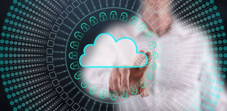 Man touching a cloud networking concept on a touch screen with his finger