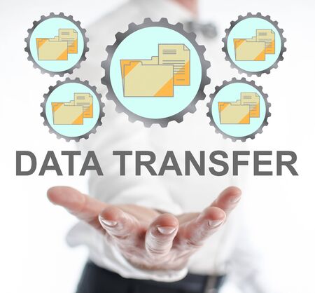 Data transfer concept levitating above a hand of a manの写真素材