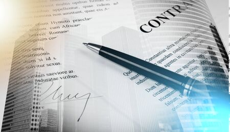 Signed contract with pen; multiple exposureの写真素材