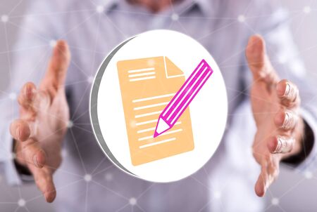 Document concept between hands of a man in backgroundの写真素材