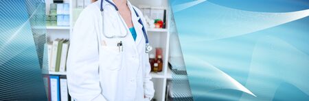 Female doctor in her office; panoramic bannerの写真素材