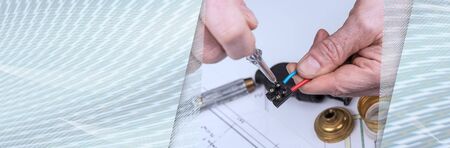 Clamping a wire in a connector; panoramic banner