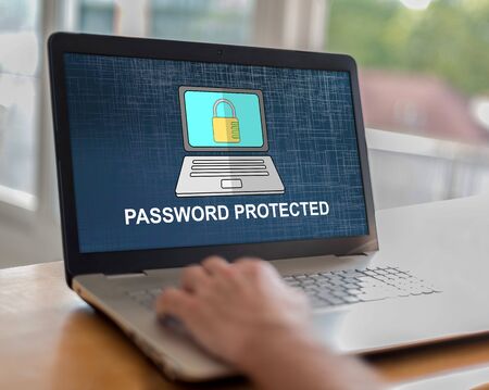 Man using a laptop with password protected concept on the screen