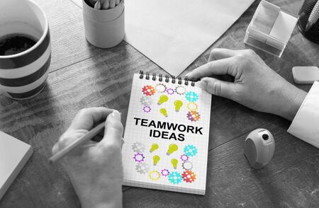 Teamwork idea concept drawn on a notepadの写真素材