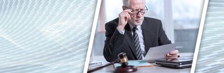 Lawyer working on legal document; panoramic banner