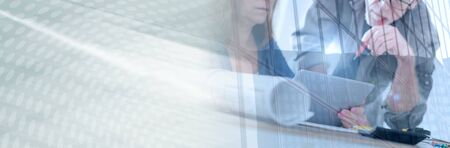 Architects working on plans at office, double exposure; panoramic bannerの写真素材