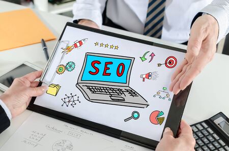 Seo concept shown by a businessmanの写真素材