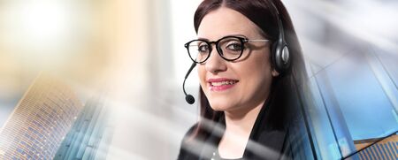 Portrait of smiling female phone operator with headset; multiple exposure