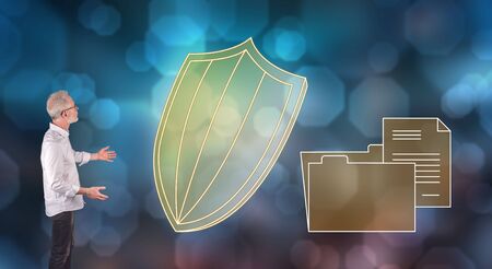 Businessman showing a data protection concept on a wall screenの写真素材