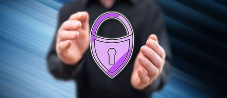 Cyber security concept between hands of a man in backgroundの写真素材