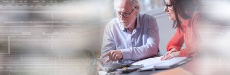 Businesspeople working together in office; panoramic bannerの写真素材