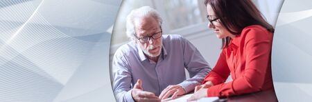 Businesspeople working together in office; panoramic bannerの写真素材