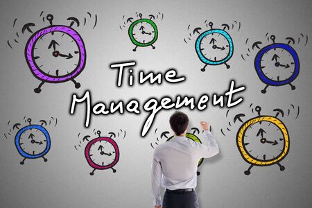 Time management concept drawn by a businessmanの写真素材