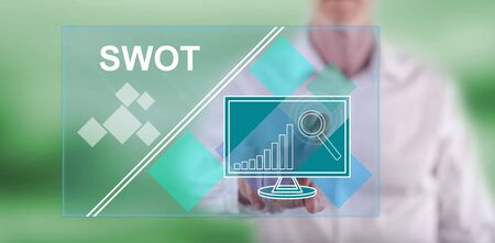 Man touching a swot concept on a touch screen with his fingerの写真素材