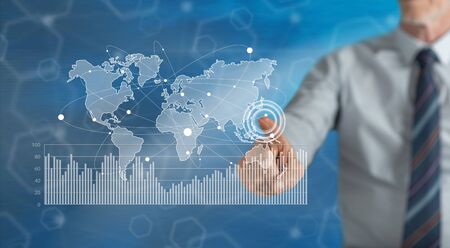 Man touching a digital marketing statistics concept on a touch screen with his finger