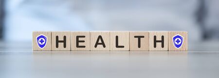 Concept of health protection on wooden cubesの写真素材