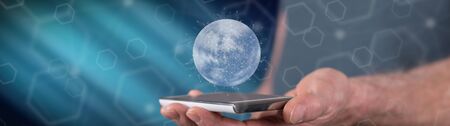 Global connection concept above a smartphone held by a manの写真素材