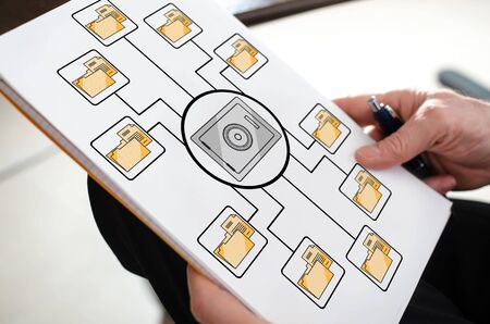 Data security concept on a paper held by a handの写真素材