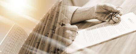 Signature of a real estate contract (lorem ipsum text used); multiple exposure