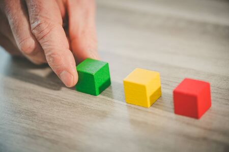 Concept of quality improvement with wooden cubesの写真素材