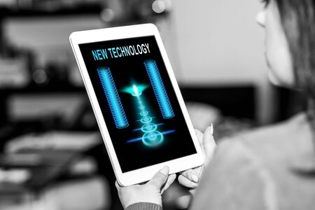 Tablet screen displaying a new technology conceptの写真素材