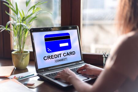 Laptop screen displaying a credit card conceptの写真素材