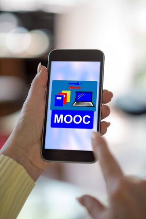 Smartphone screen displaying a mooc conceptの写真素材