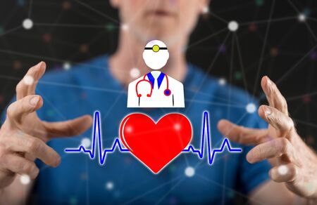 Medical service concept between hands of a man in backgroundの写真素材
