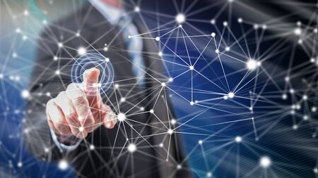 Man touching a network on a touch screen with his fingersの写真素材