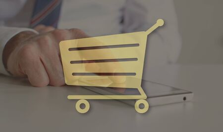 E-commerce concept illustrated by a picture on backgroundの写真素材