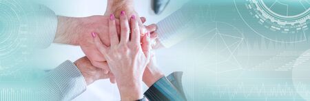 Business teamwork hands, top view; panoramic banner